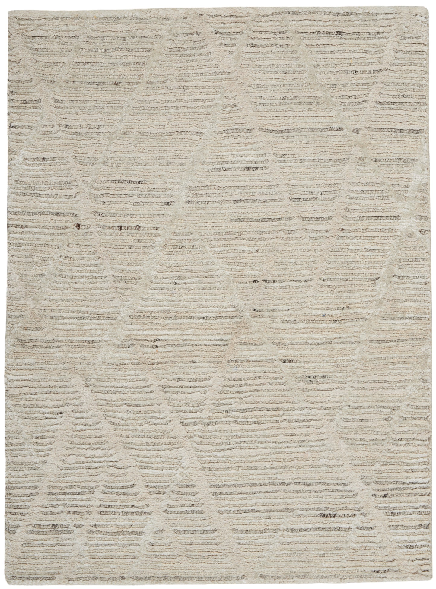 Beige textured area rug with subtle geometric triangle pattern; soft, neutral shag for living spaces.