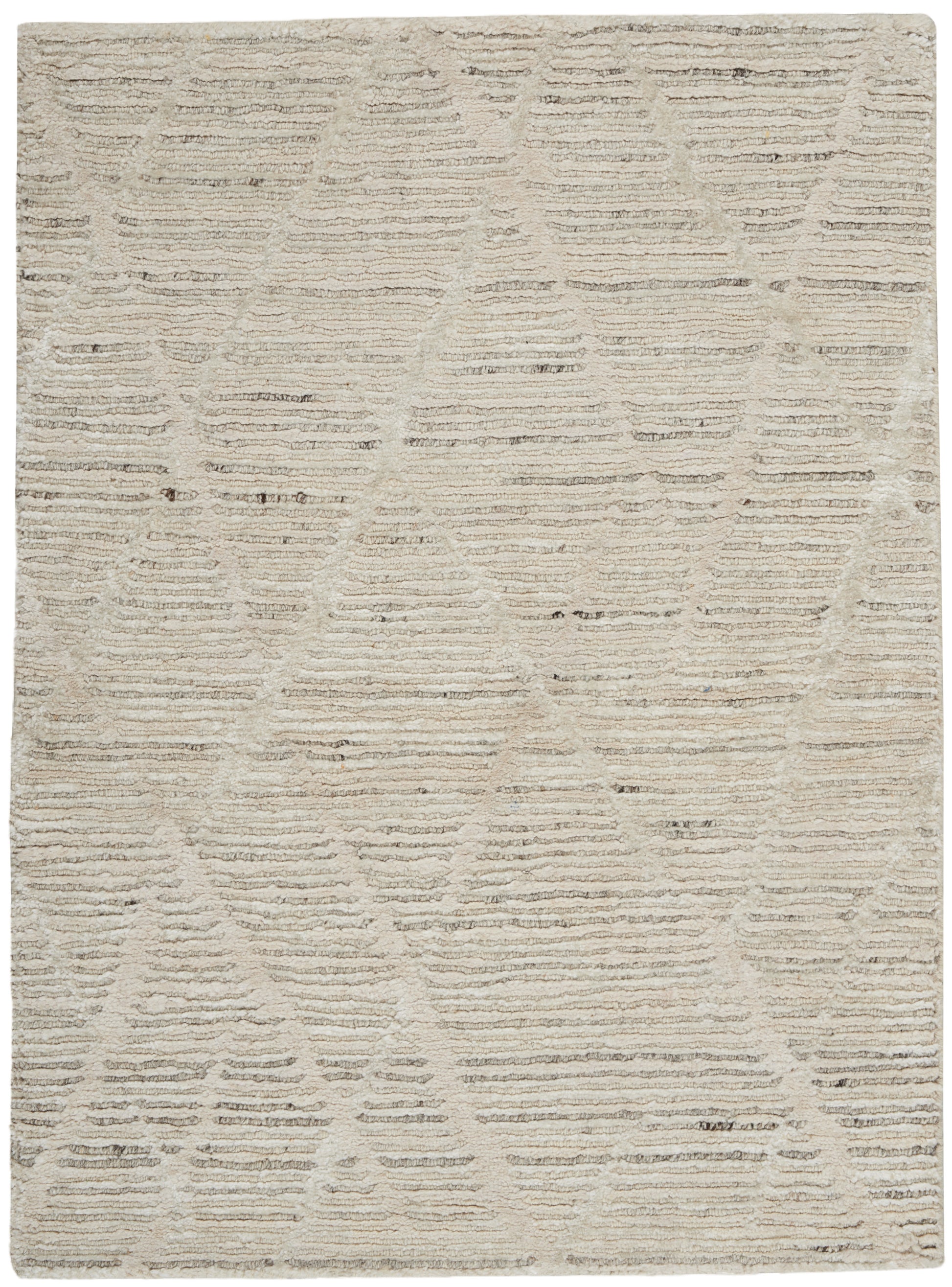Beige textured area rug with subtle geometric triangle pattern; soft, neutral shag for living spaces.