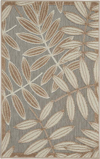 Rectangular area rug featuring beige leaves on a gray woven background; neutral botanical pattern.
