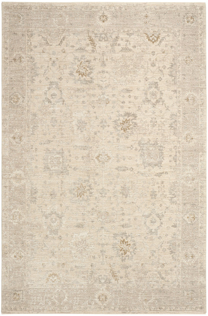 Neutral beige distressed oriental rug with pale floral motifs and a light border.