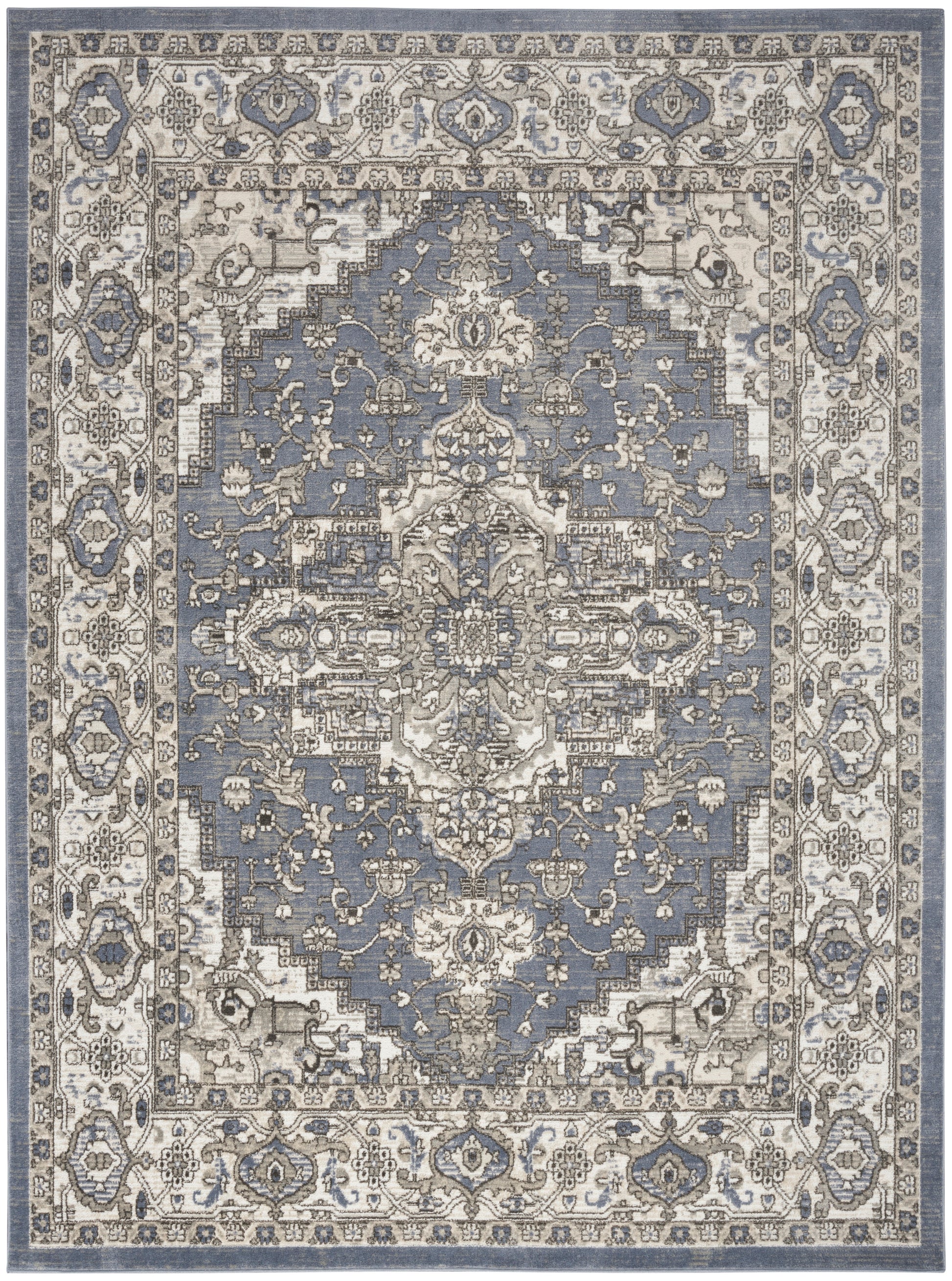 Blue-gray and ivory woven area rug with ornate central medallion and scrolling floral border, traditional oriental style.