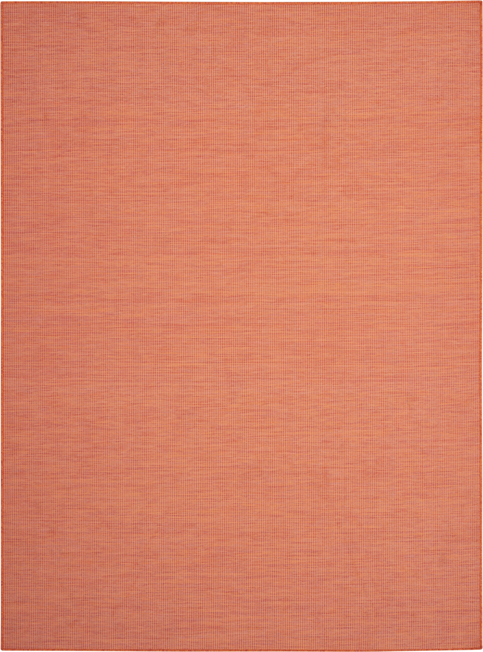 Rectangular orange woven rug with subtle grid texture; warm terra-cotta hue; flat-weave style.