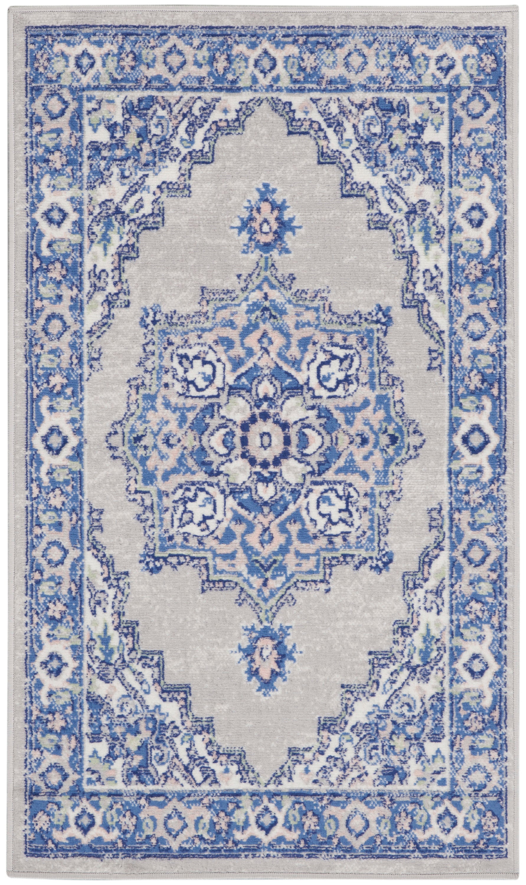 Blue and gray oriental rug with ornate central medallion, floral motifs, and decorative border.