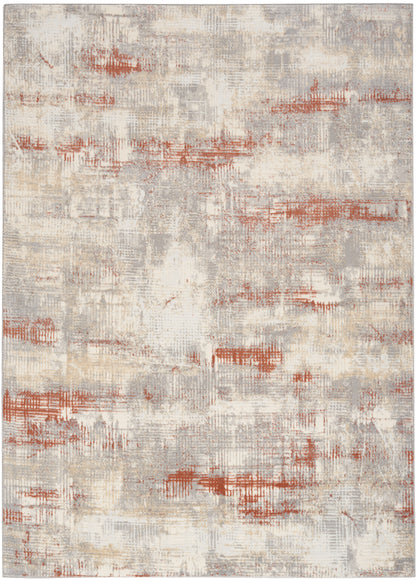 Rectangular modern abstract area rug in beige, cream and gray with rust-orange brushstroke accents.
