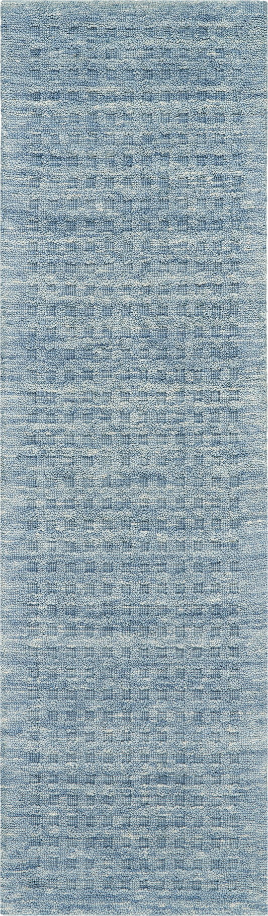 Blue textured rug with speckled loop-pile pattern in light and medium blue tones.