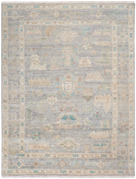 Soft blue-gray Persian-style area rug with ivory borders, subtle cream and turquoise motifs, fringed ends.