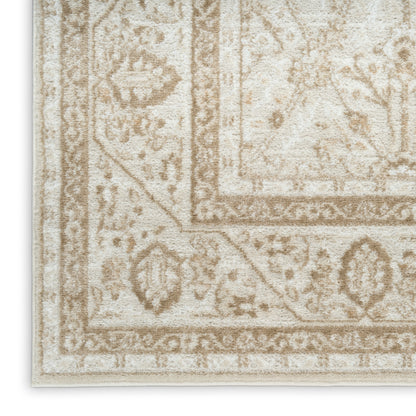 Beige oriental rug corner with taupe border and intricate damask patterns; soft plush pile.