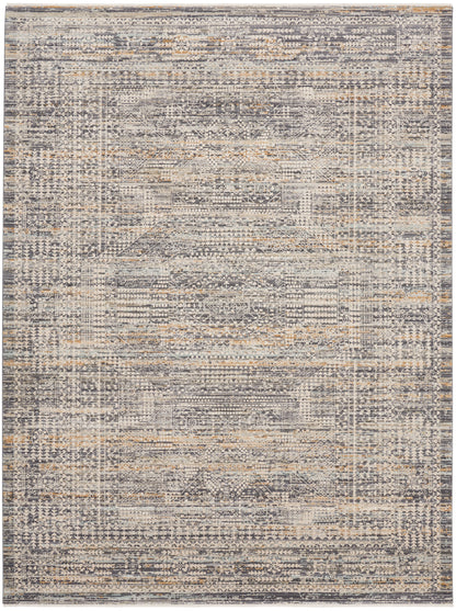 Distressed gray & ivory area rug with faded geometric oriental motifs & subtle tan accents.