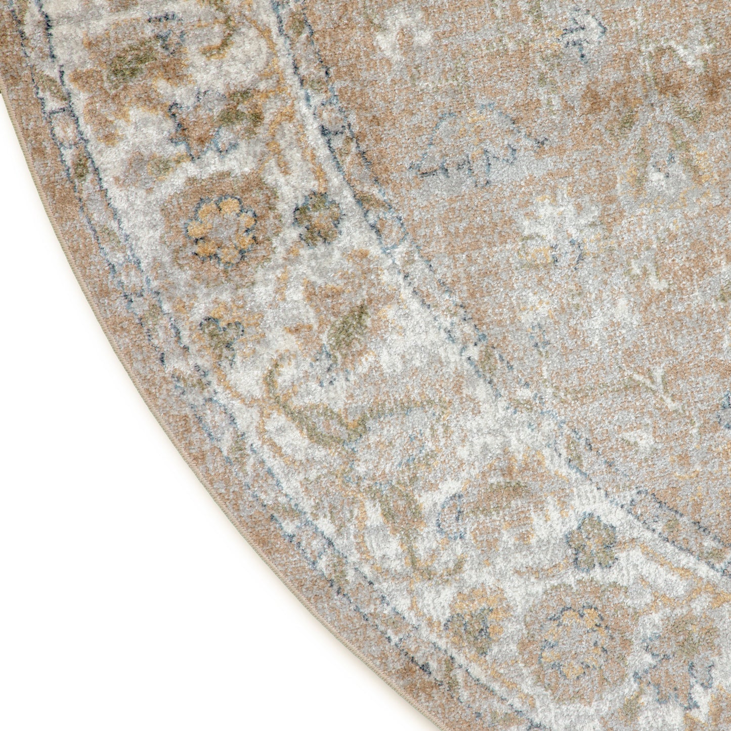 Beige distressed oriental rug with blue and ivory floral pattern and curved edge.