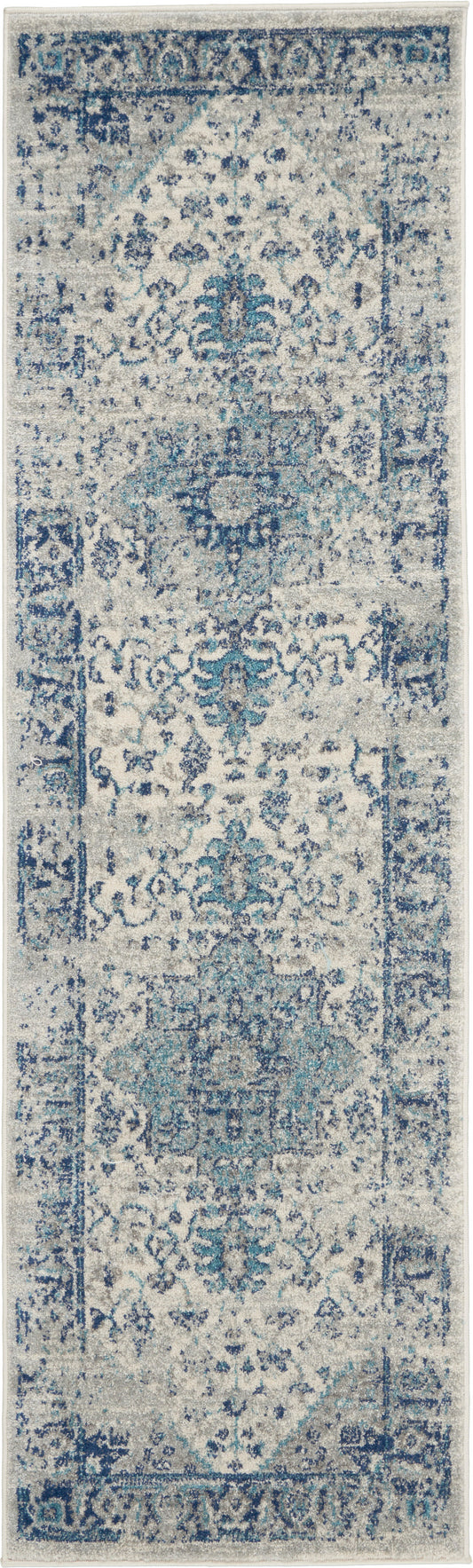 Blue & ivory distressed Persian-style runner rug with intricate floral motifs and vintage look.