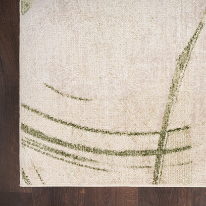 Beige rectangular rug with abstract green curved lines on a dark wooden floor.