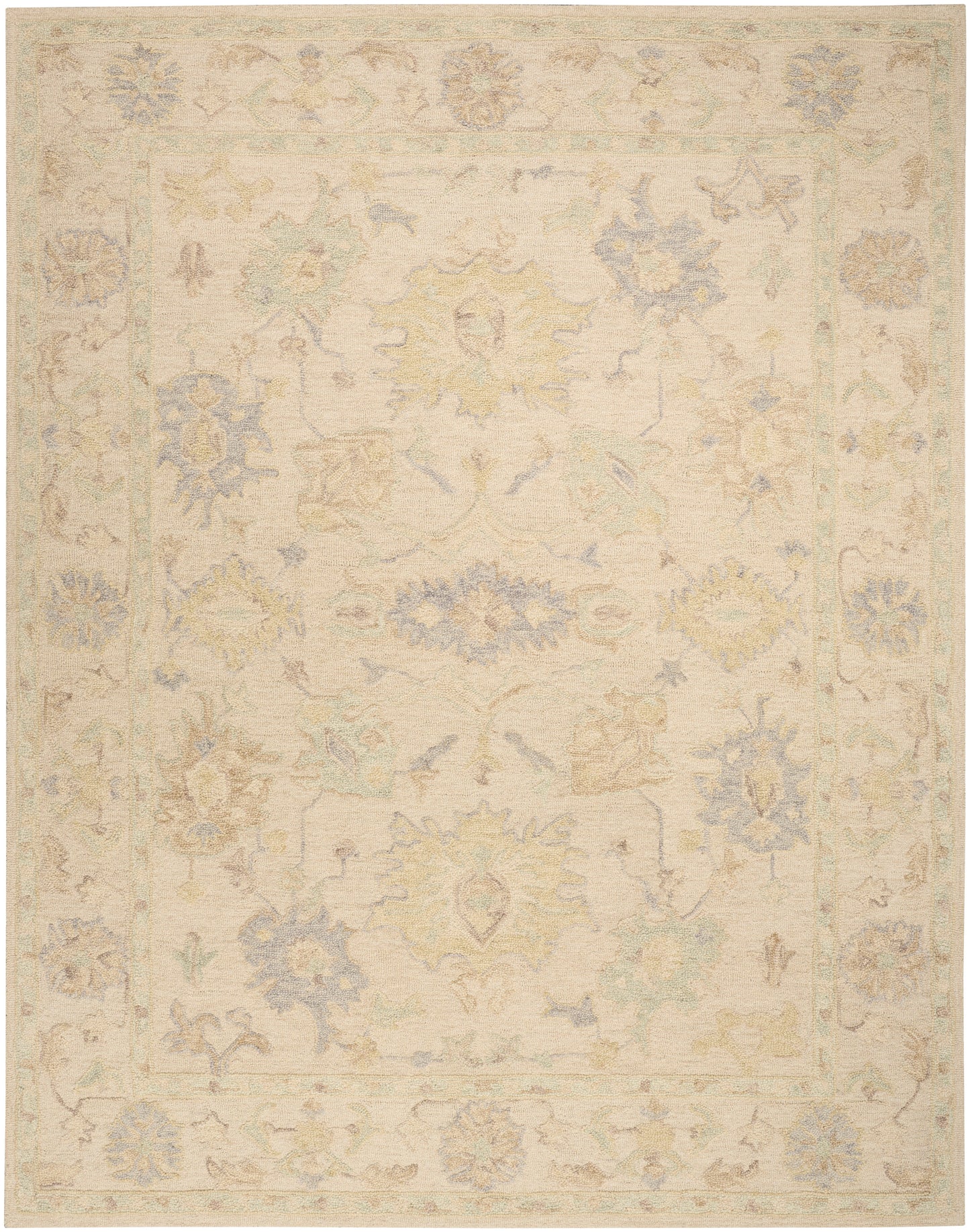 Muted cream vintage Persian-style area rug, 9' x 12', with pale blue, yellow, and green floral motifs and a delicate border.