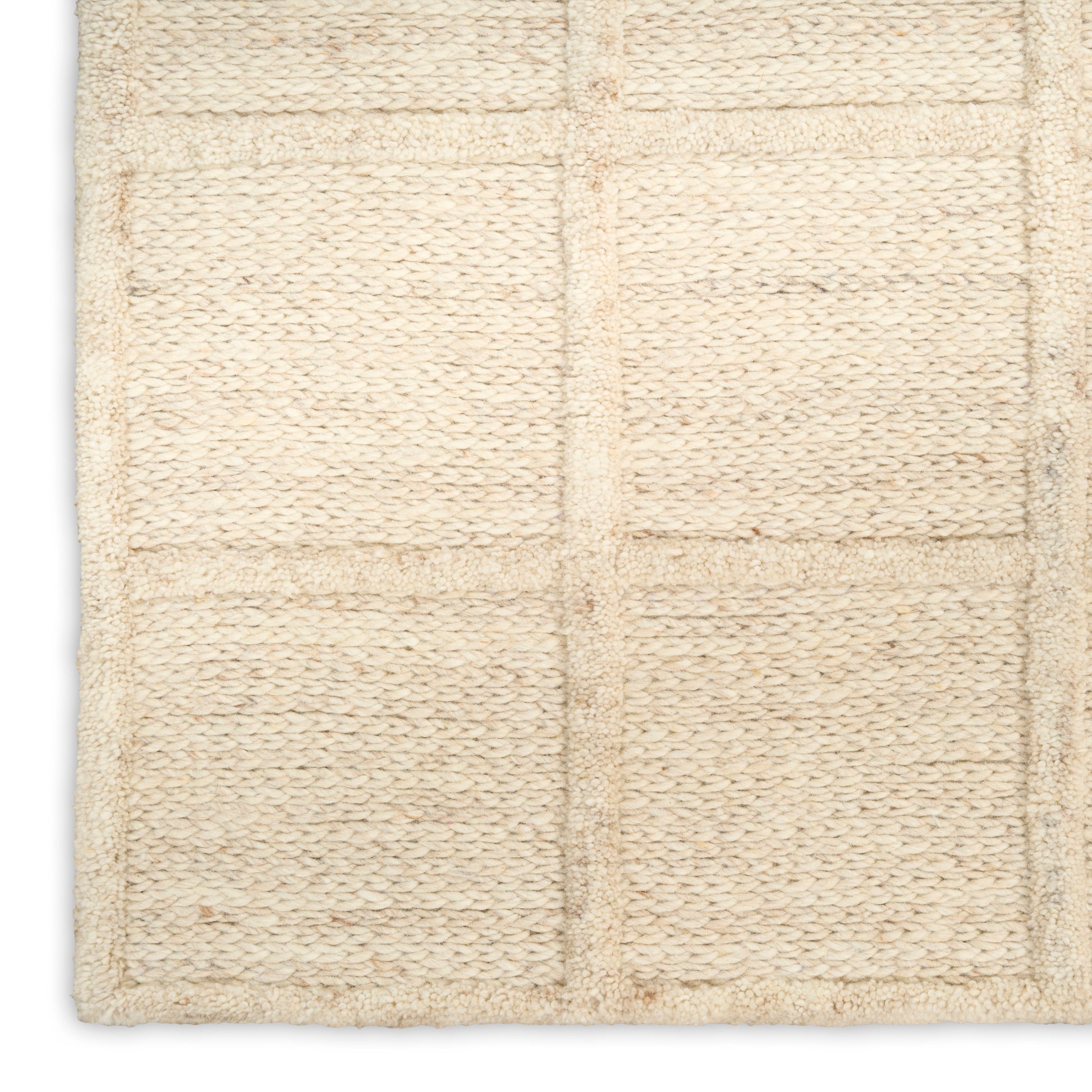 Cream rectangular woven rug with square panel grid and looped texture.