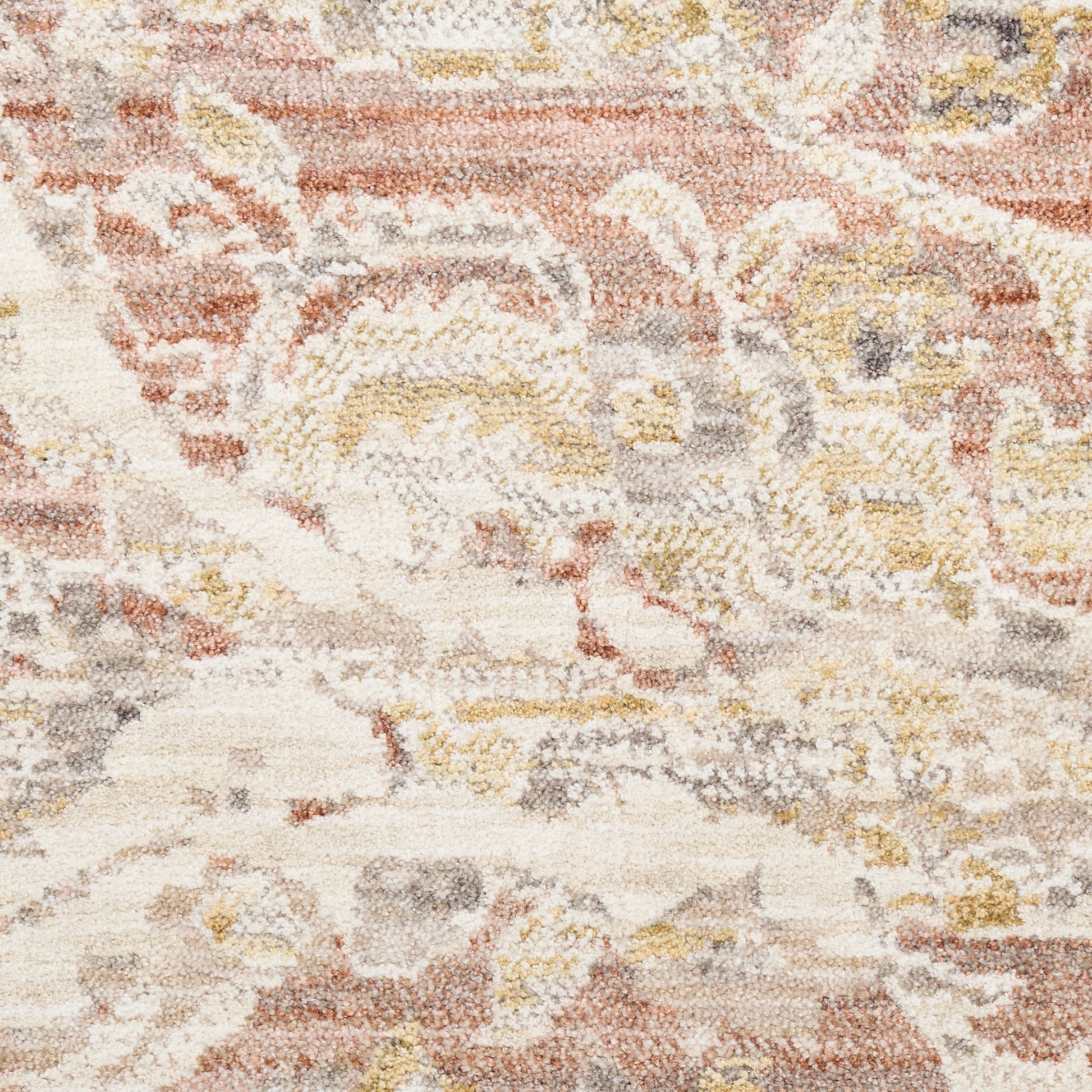 Distressed vintage-style area rug in ivory, blush pink, mustard and gray with abstract floral pattern