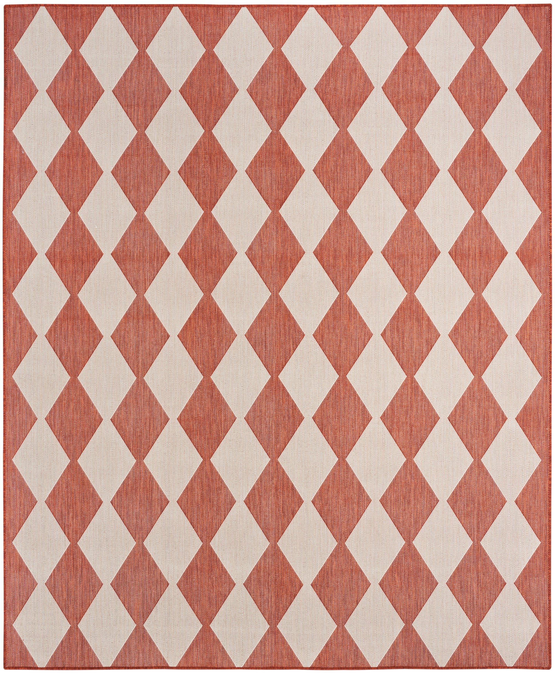Rust-red rug with cream diamond harlequin pattern, woven texture; rectangular geometric area rug.