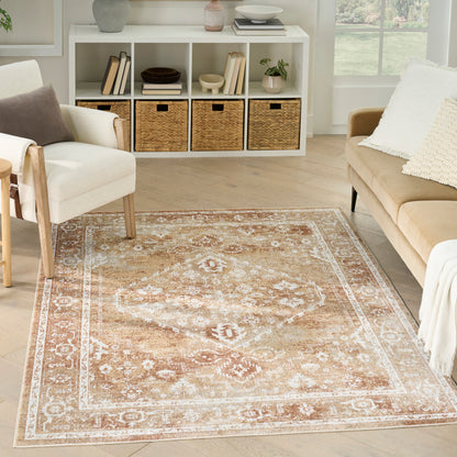 Neutral oriental-inspired area rug in ivory, beige & tan tones, in a living room with a white cube shelf & wicker baskets.