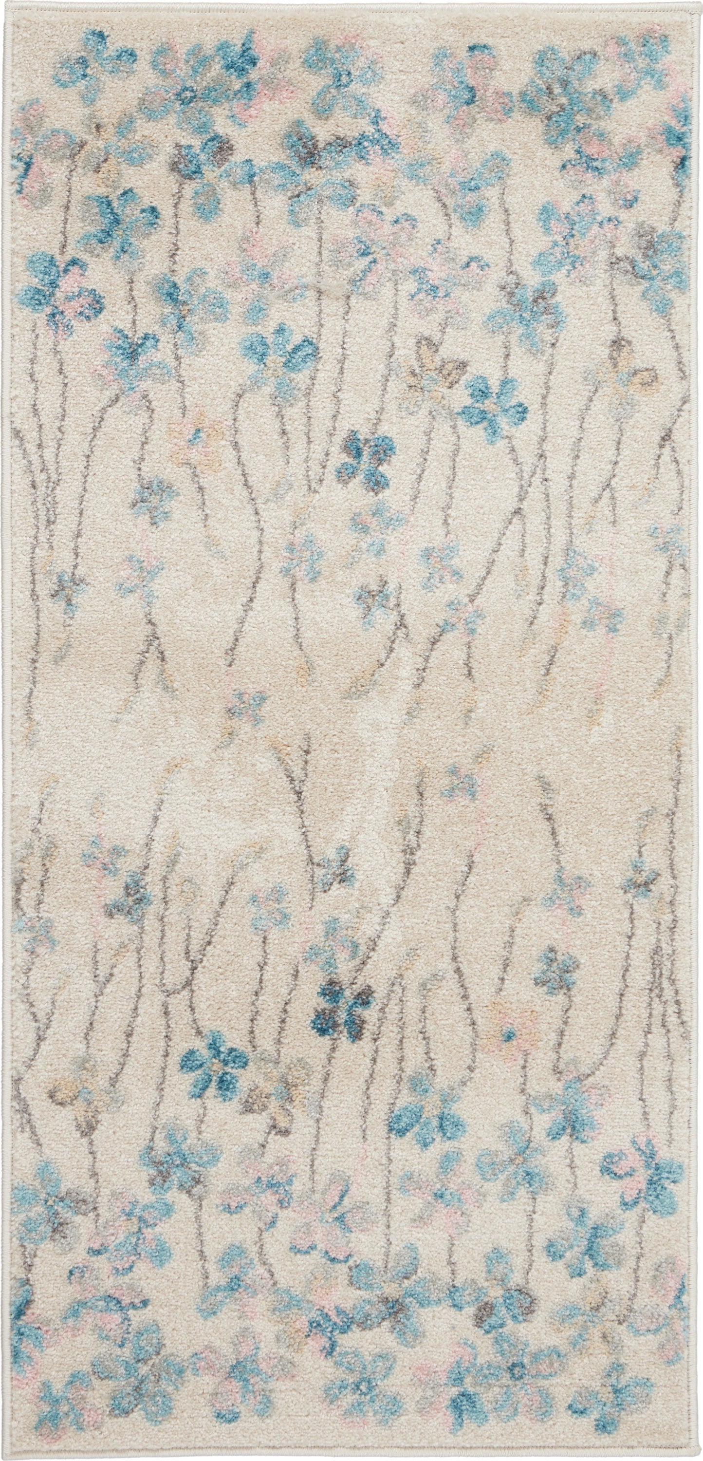 Beige area rug with pale blue floral branches and gray stems in a soft botanical pattern.