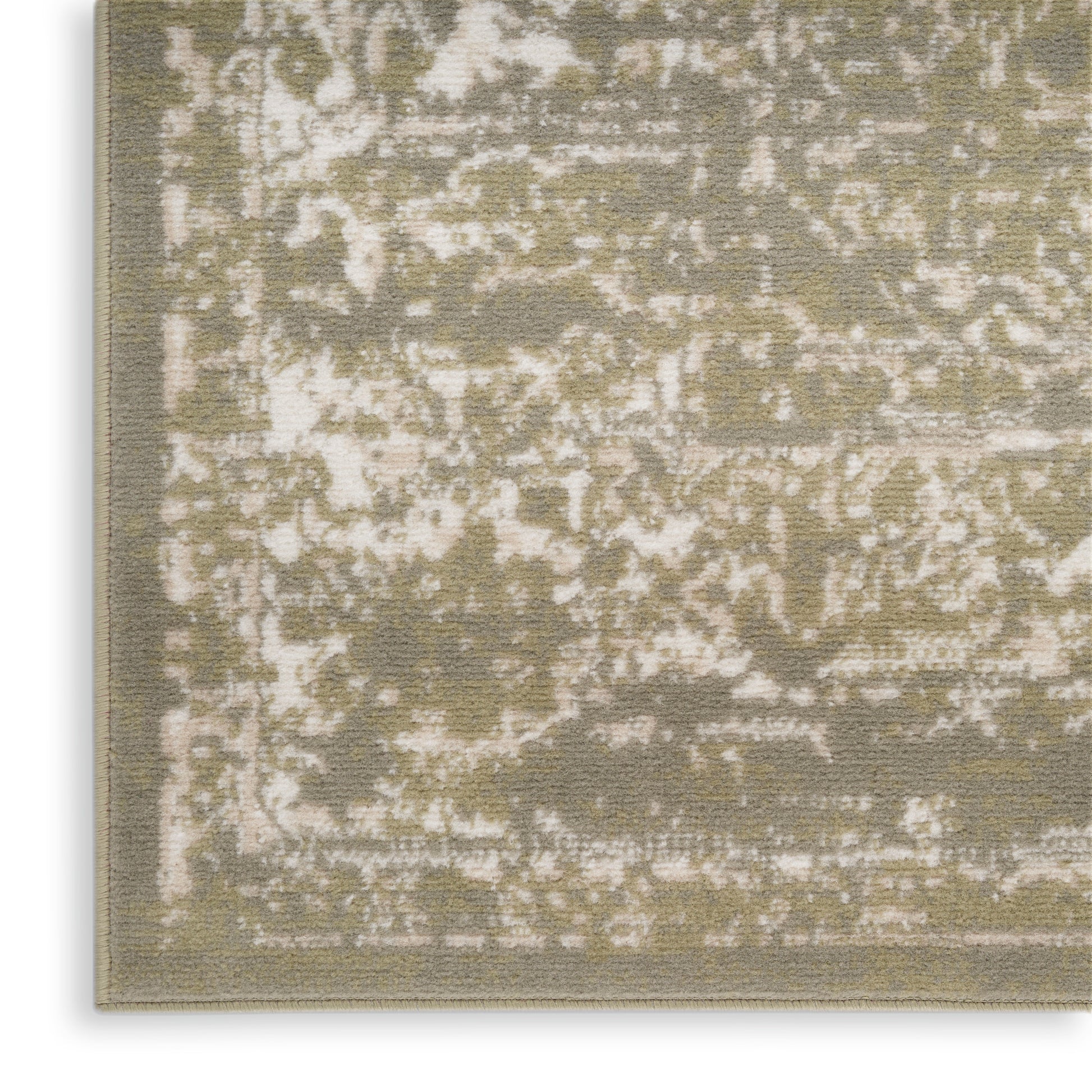 Olive green and cream distressed low-pile rug with abstract oriental pattern and bound edge.