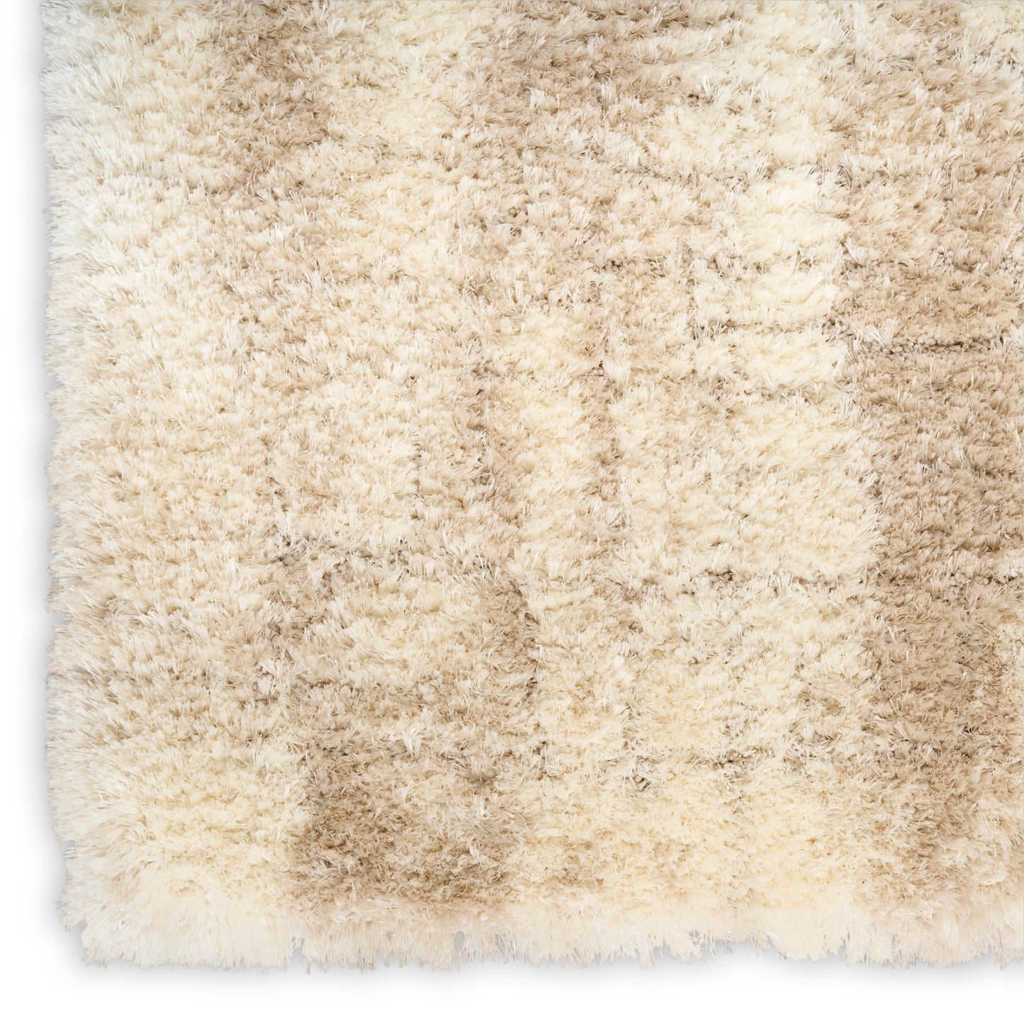 Beige & cream shag rug with long fluffy pile; plush, cozy rectangular area rug for living rooms.