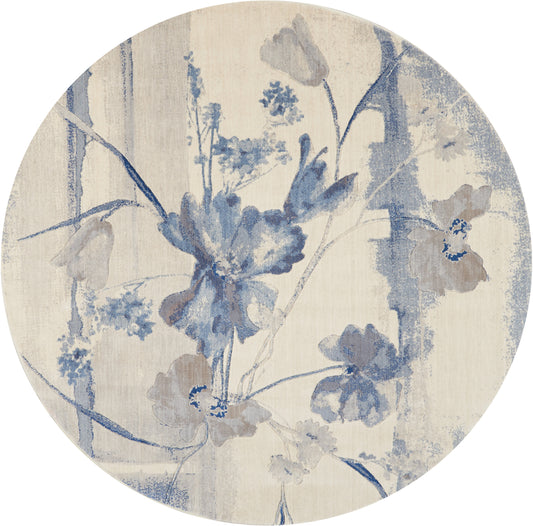 Round rug with blue floral motif on light beige background; vintage botanical design.