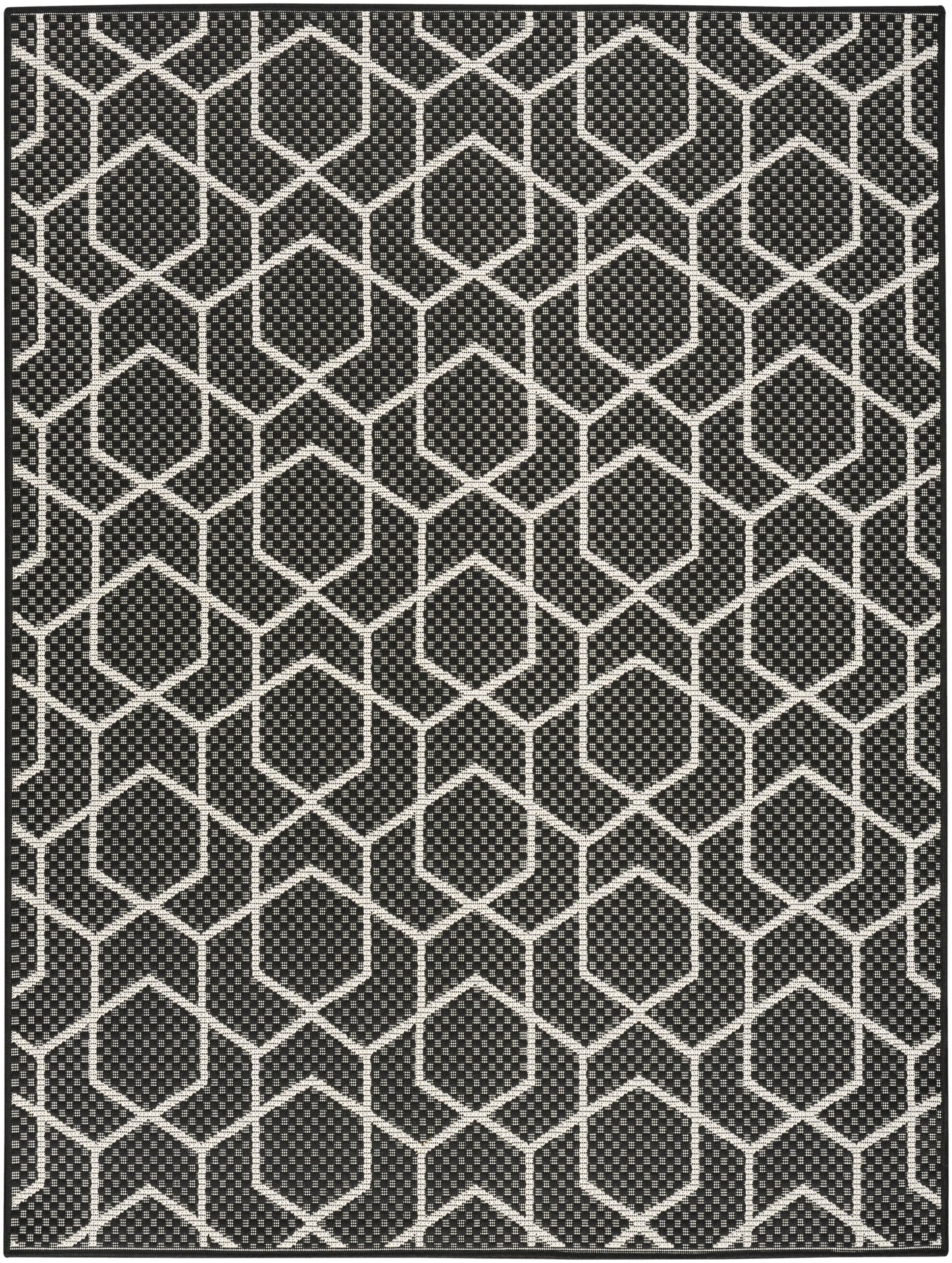 Black rug with white hexagon lattice pattern and dotted interior detail.