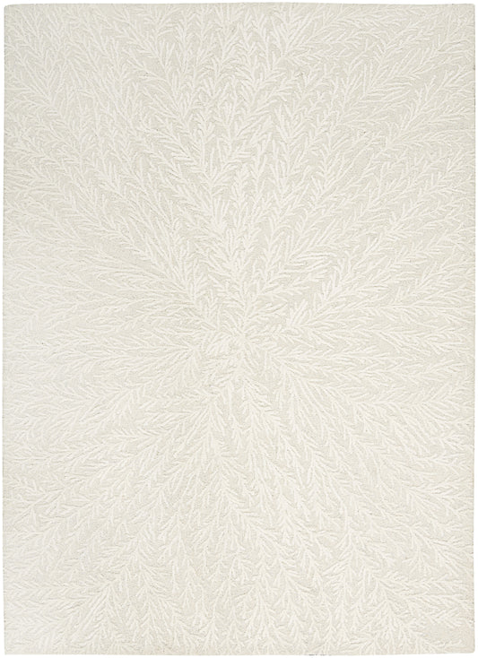 Cream textured rug with a raised fern-like pattern and soft boucle pile.