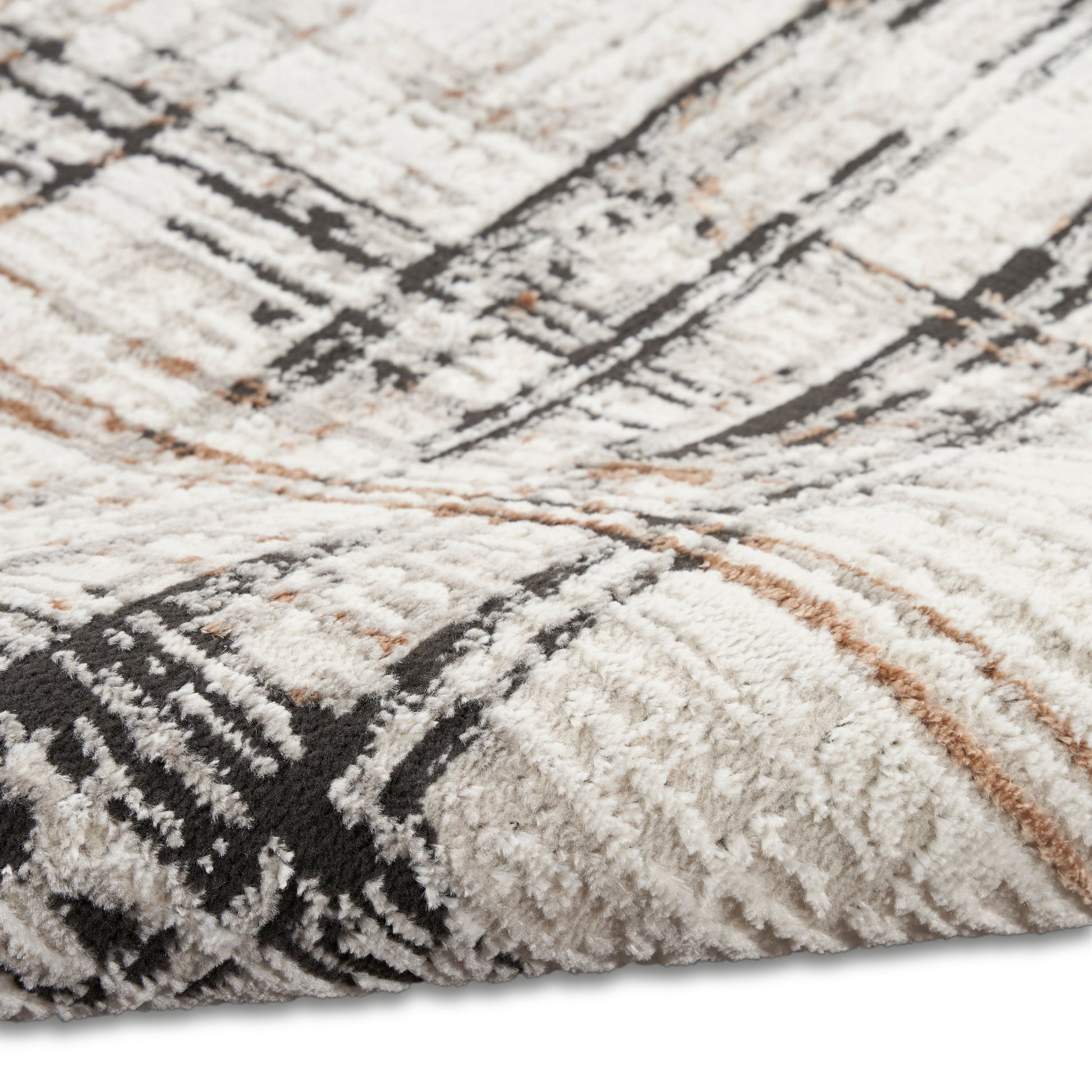 Cream shag rug with black & taupe geometric lines, textured plush pile, modern area rug.