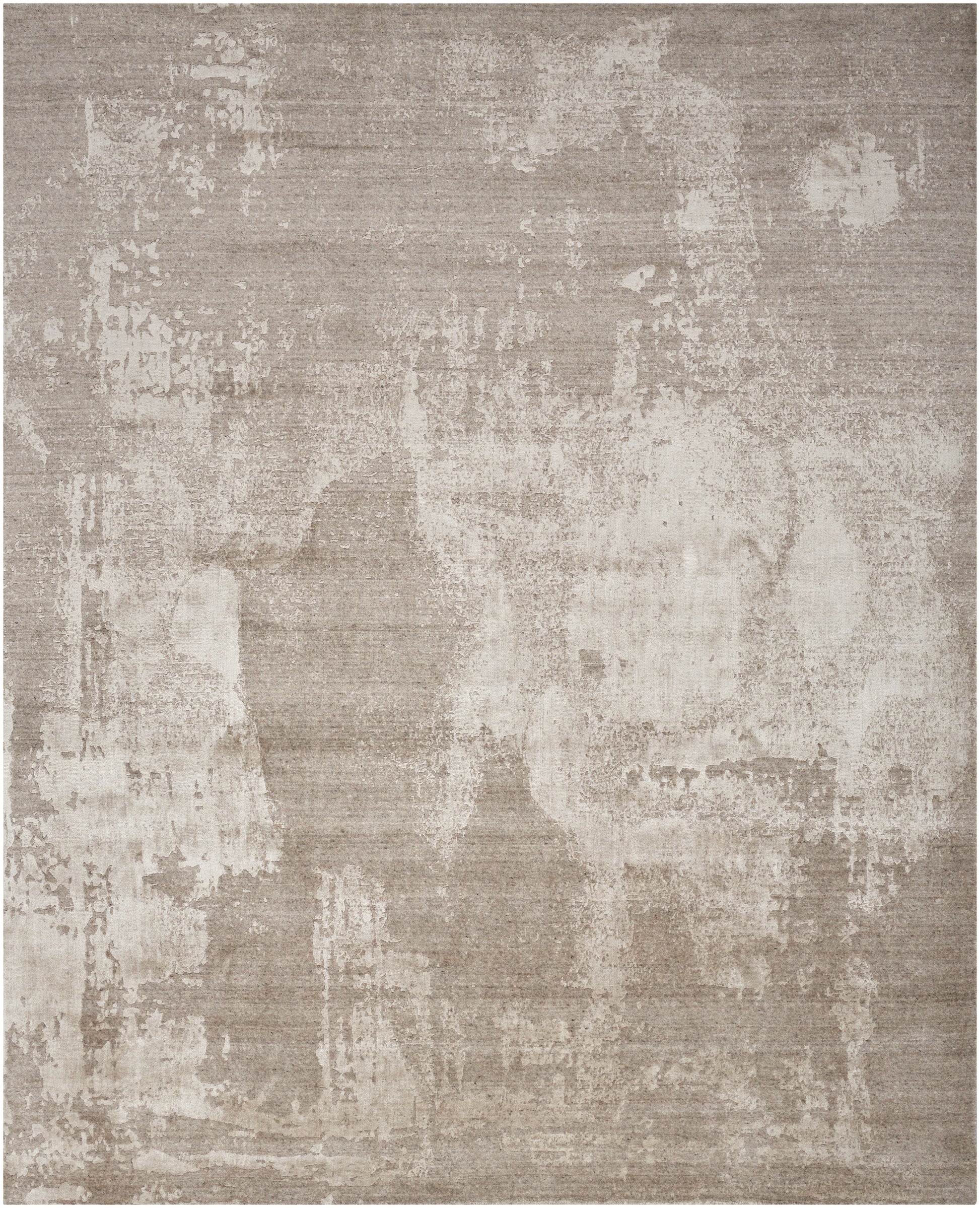 Abstract distressed beige area rug with muted taupe and cream tones, modern style.