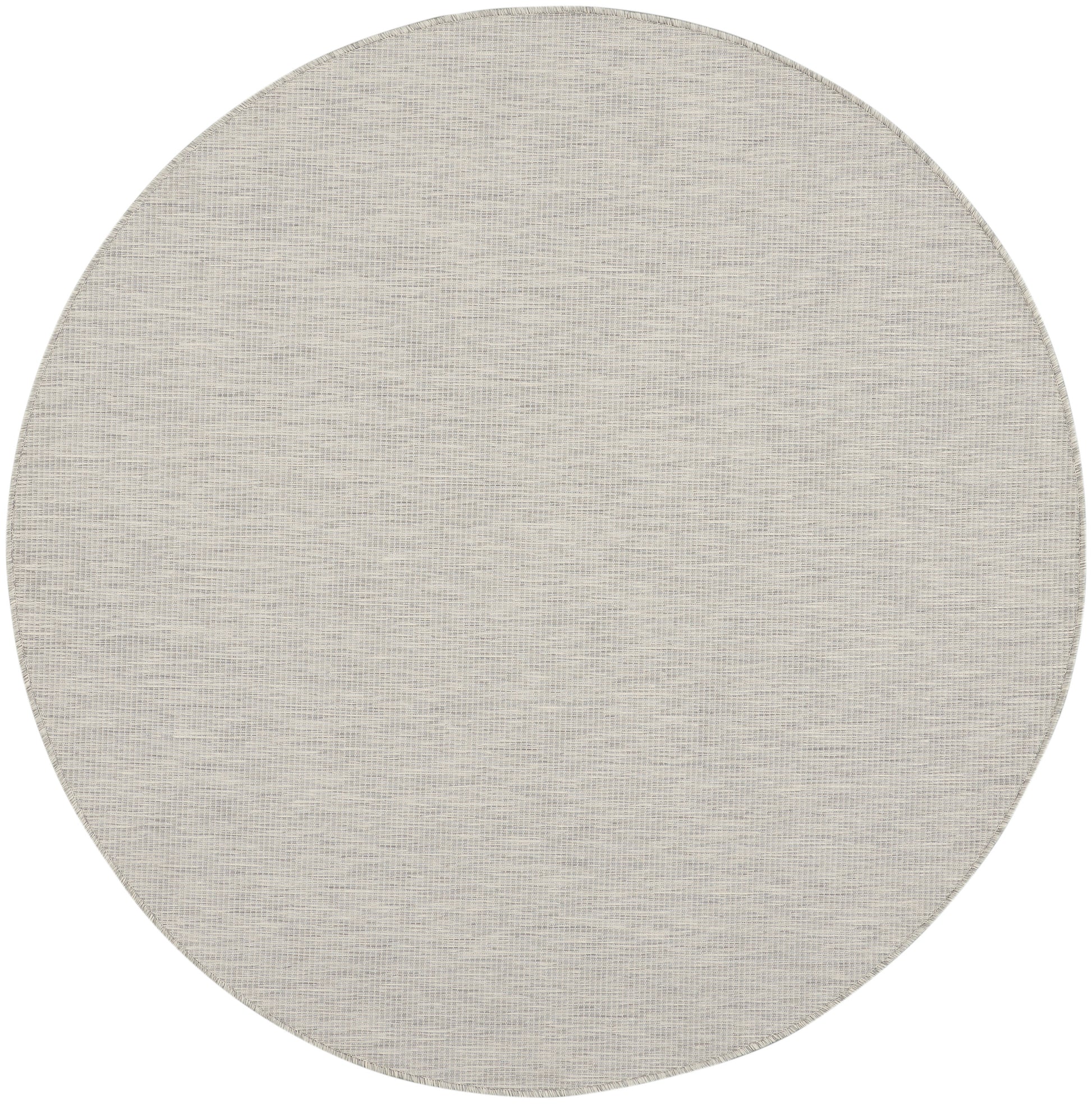 Beige circular rug with a subtle woven texture in soft neutral tones.