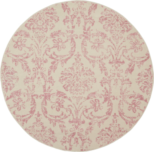Round rug with pink damask pattern on cream background; vintage, elegant home décor.