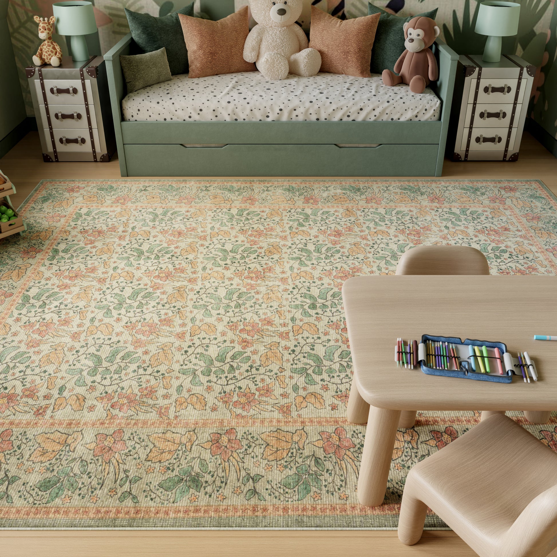 Pastel green kids' daybed with storage, teddy bears, and floral peach-green rug; wooden table with colored pencils.