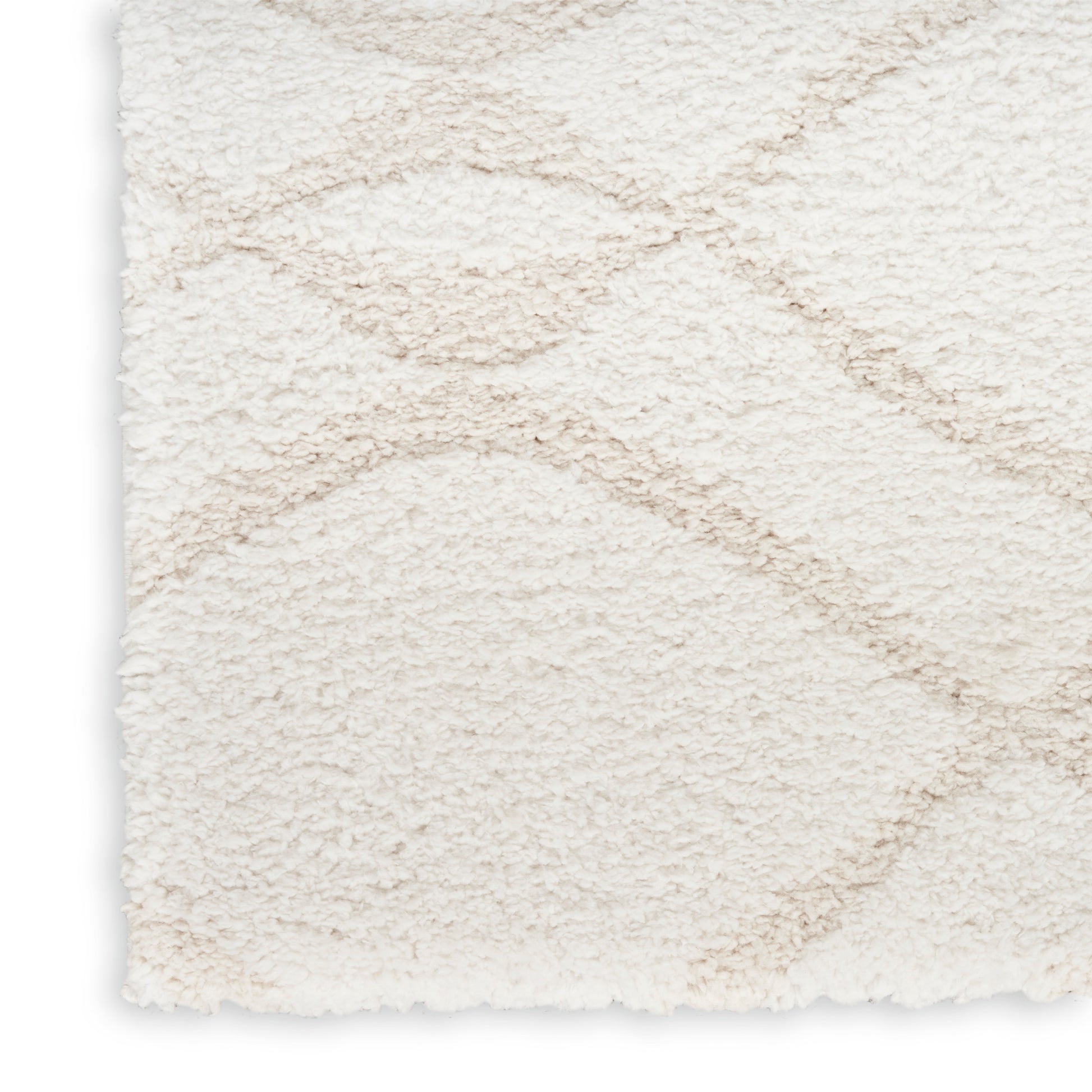 Cream shag rug close-up with plush pile and soft wave pattern, cozy living room decor