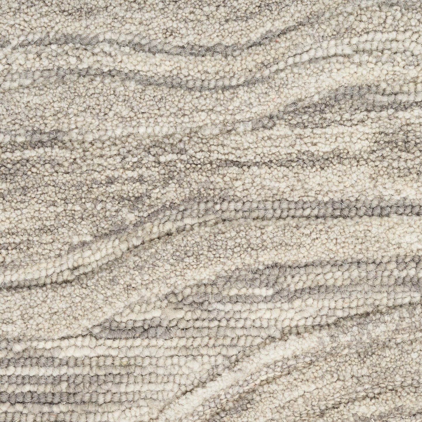Beige and gray boucle rug with plush loop texture and soft, wavy stripes for cozy living room decor.