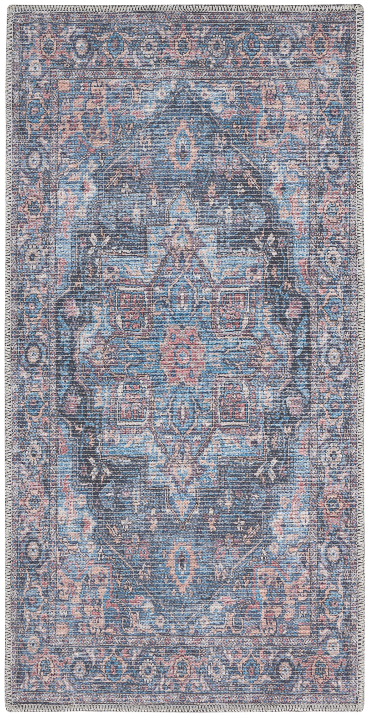 Blue and blush pink Persian-style area rug with intricate central medallion and ornate border.