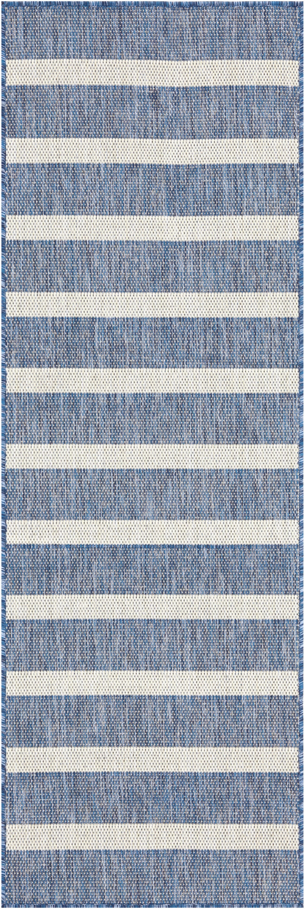 Blue and cream striped woven rug runner; denim blue stripes, ivory bands, braided edge, casual coastal style.