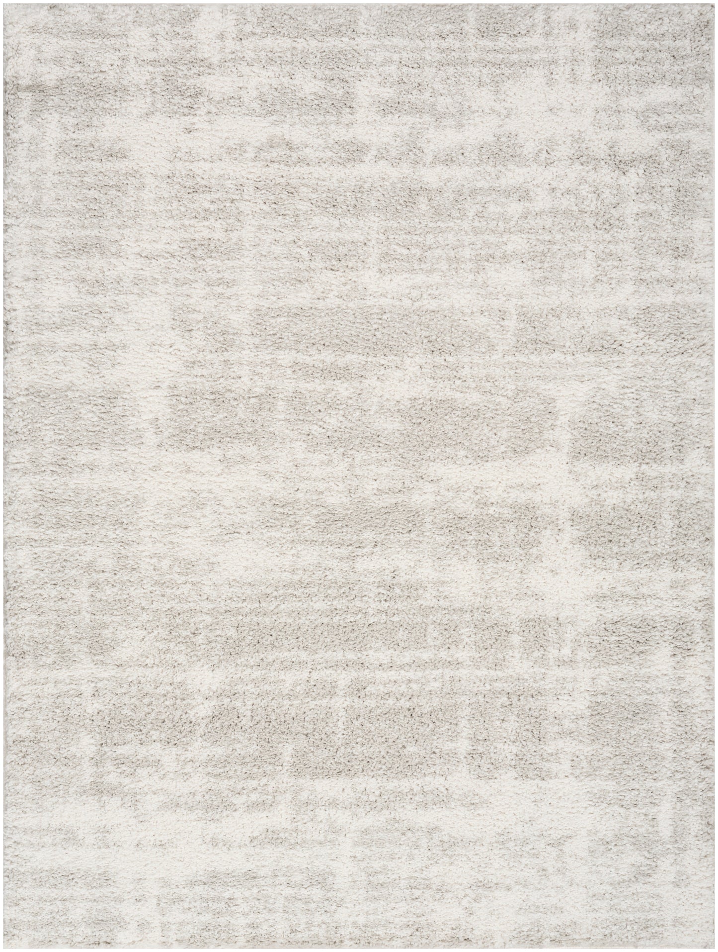 Cream & beige textured area rug with a subtle distressed abstract pattern; soft, neutral decor.