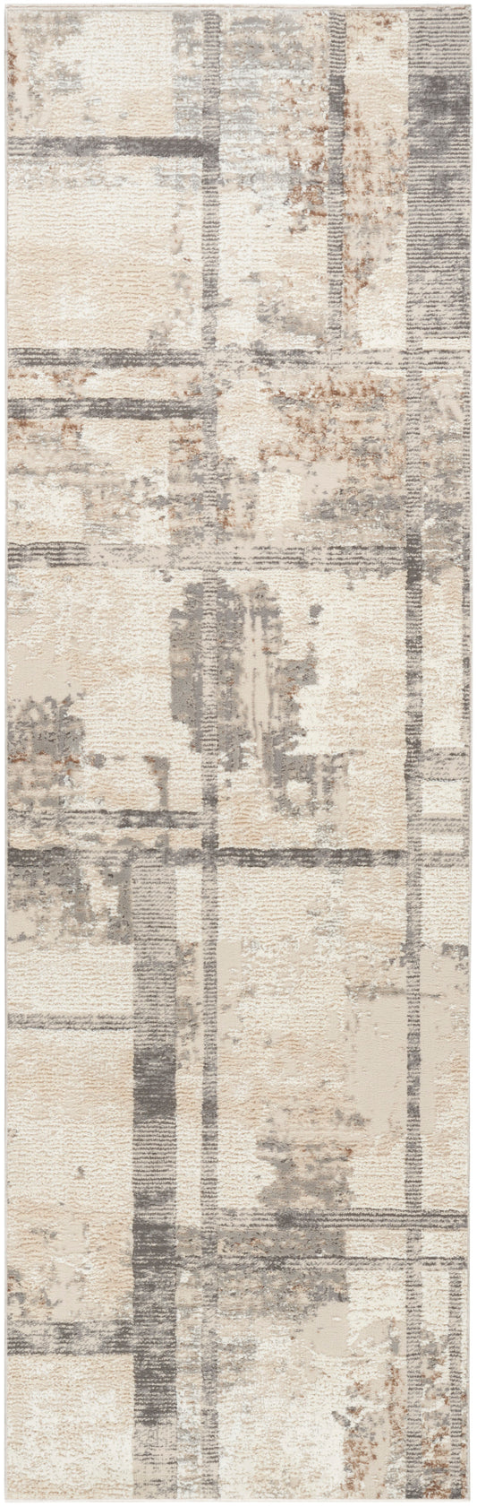 Rectangular abstract area rug in neutral beiges, grays and taupe with distressed patchwork grid pattern.