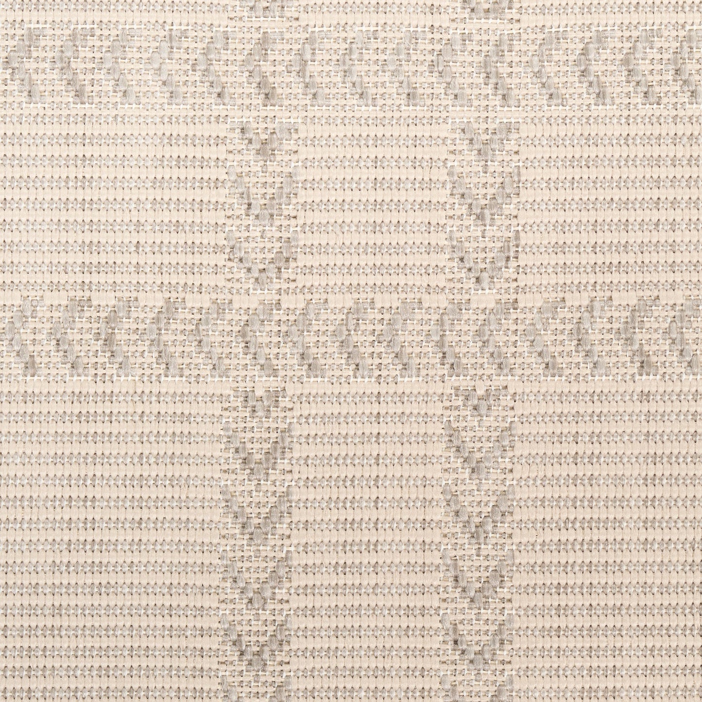 Beige woven knit fabric with subtle chevron pattern and soft neutral texture.