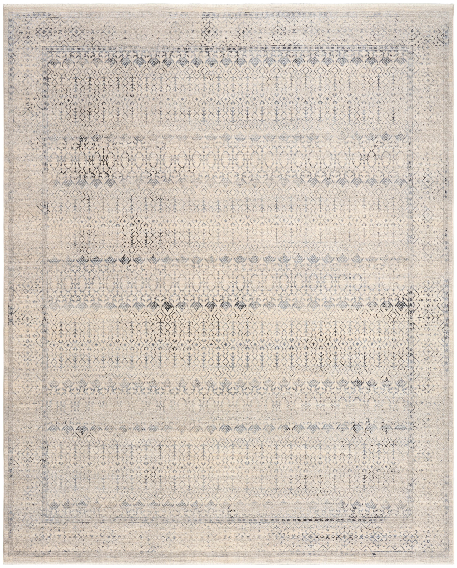 Distressed beige-blue oriental area rug with faded diamond motifs and a bordered frame.