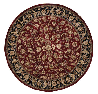 Round Persian-style rug with deep red center and black-gold floral border; ornate gold-on-red pattern.