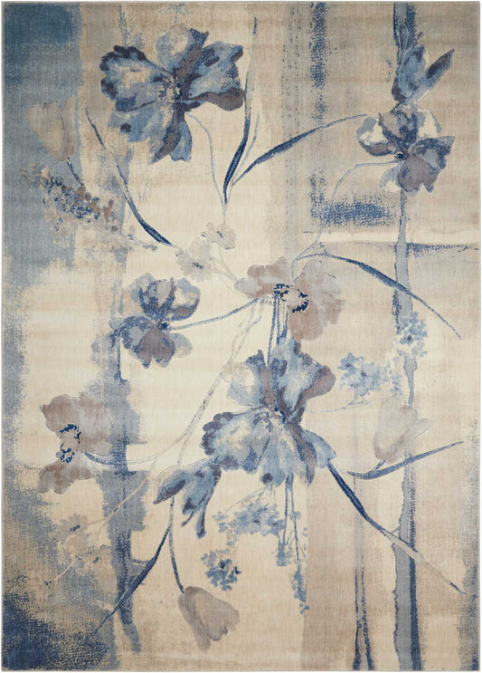 Rectangular blue and ivory floral rug with abstract vertical stripes; soft woven texture for living room decor.