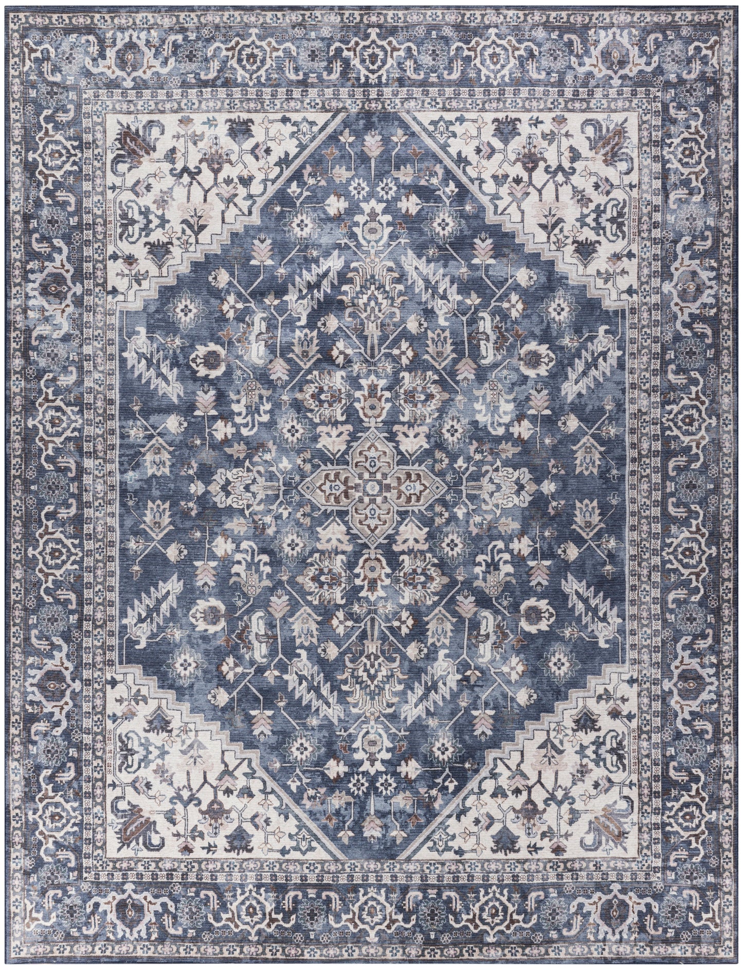 Blue oriental area rug with central medallion, ivory/cream floral motifs and layered borders; distressed vintage look.
