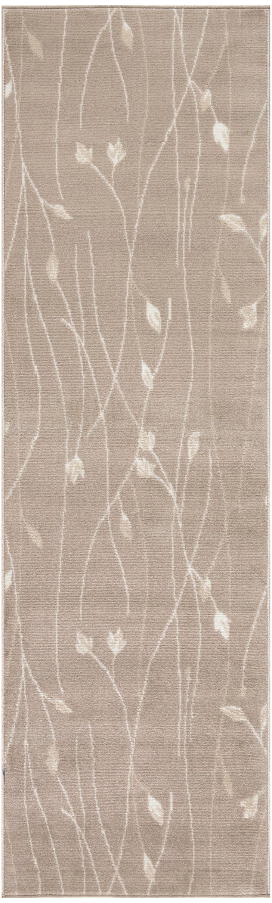 Beige taupe rug with white vine and leaf pattern, slender twig-like lines across soft textured surface.