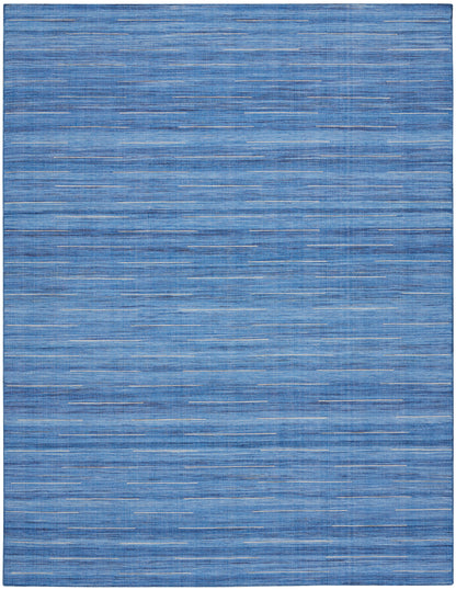 Blue rectangular rug with a denim-like weave and slim white horizontal streaks for a modern look.