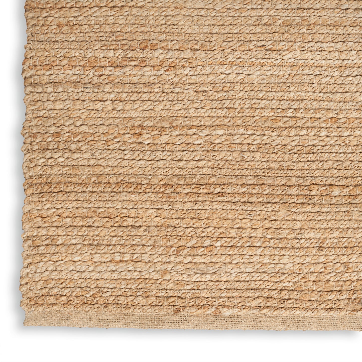 Beige gradient rug with rough, crumbly textured borders along the left and right and a smooth center in warm tan tones.