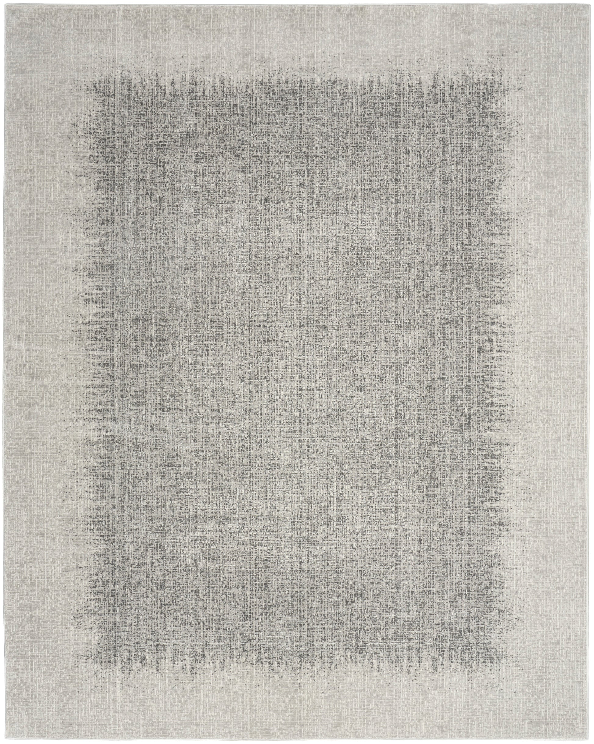 Neutral beige-gray rug with a large softly faded dark rectangle in the center, modern distressed look.