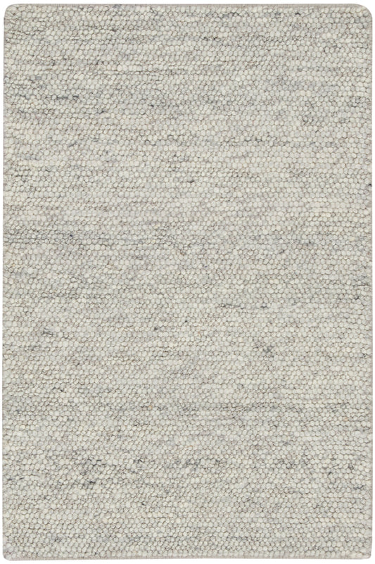 Beige speckled loop-pile rug with gray undertones; rectangular with rounded corners, cozy neutral decor.