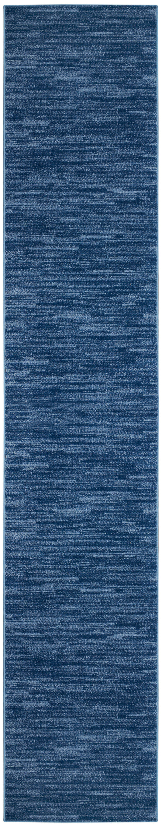 Rectangular blue marled runner rug with a textured woven pattern in navy and lighter blue tones.