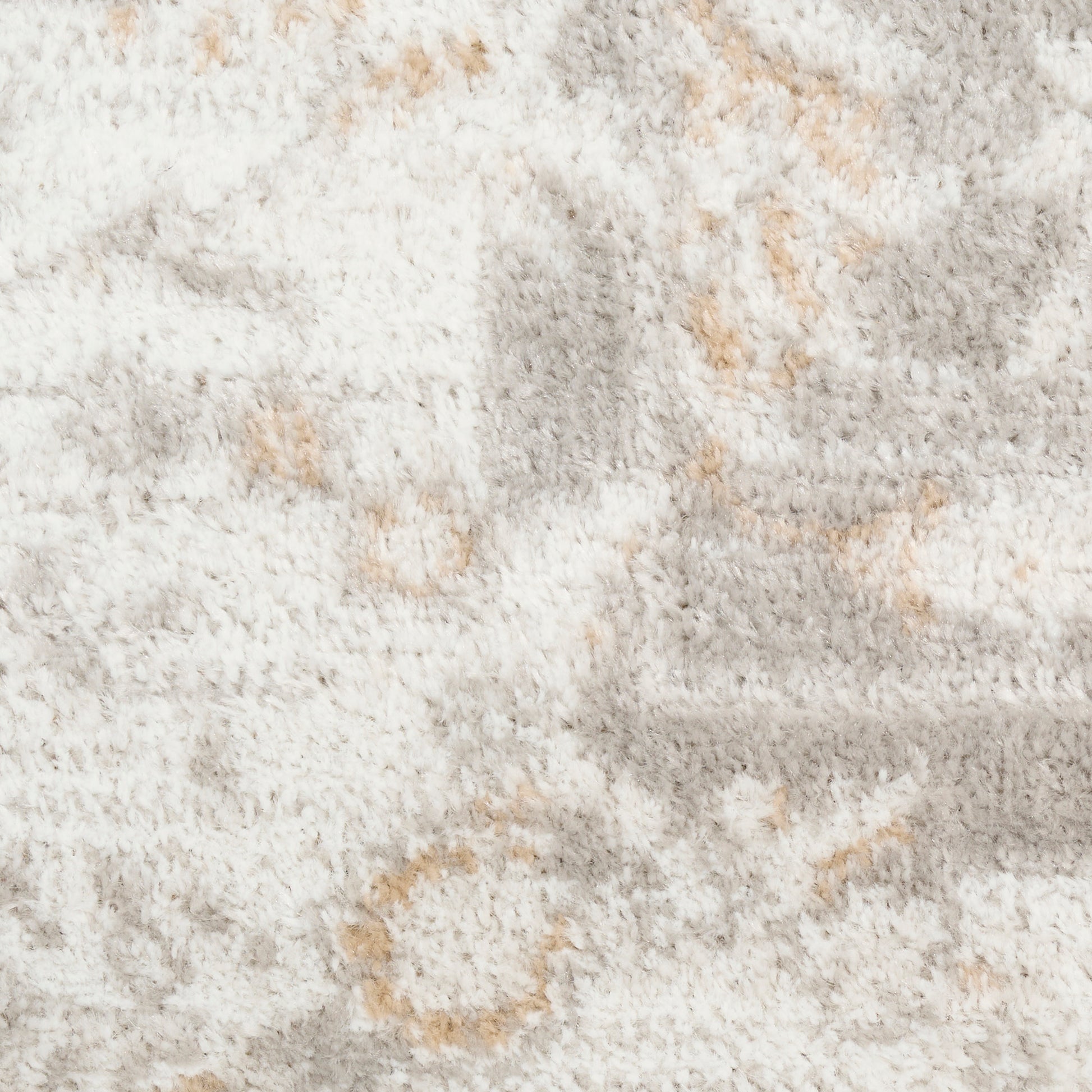 Cream and light gray rug with subtle beige geometric pattern; soft plush pile for cozy decor.