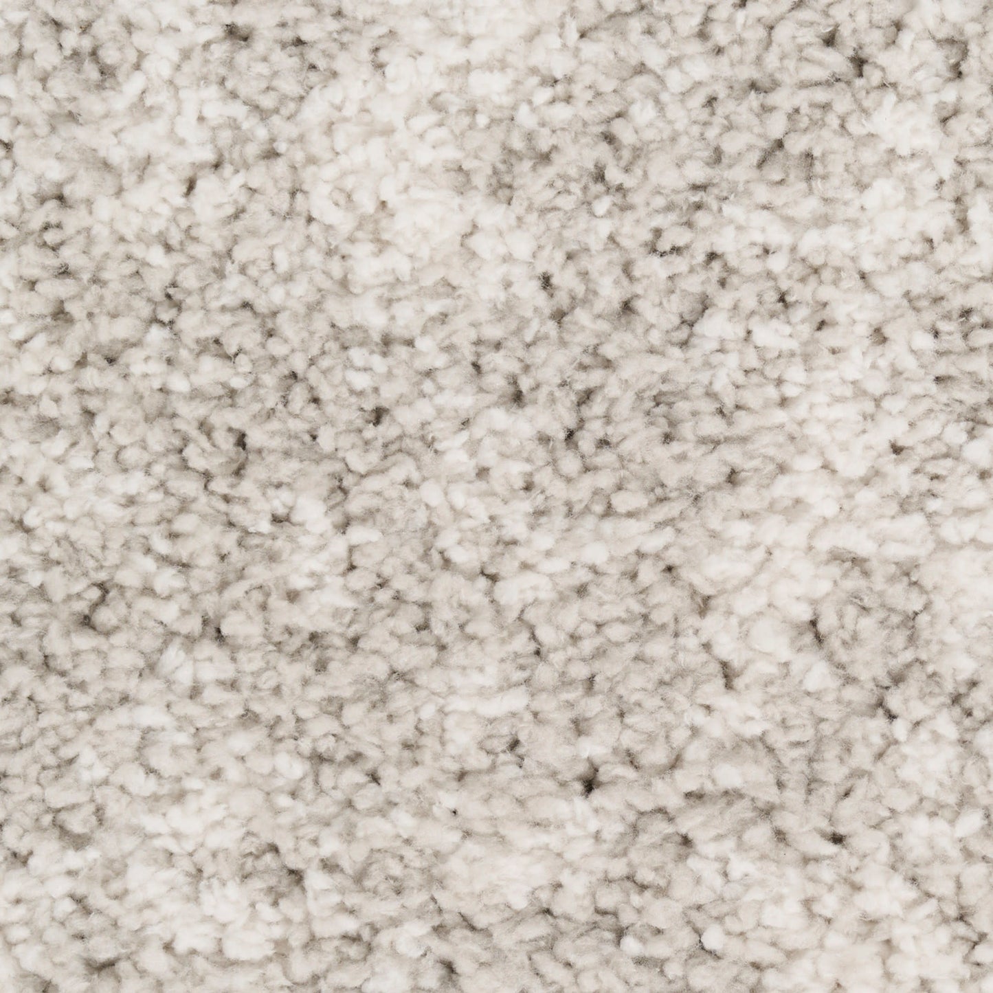 Beige high-pile shag rug with plush, dense fibers for a cozy floor accent.